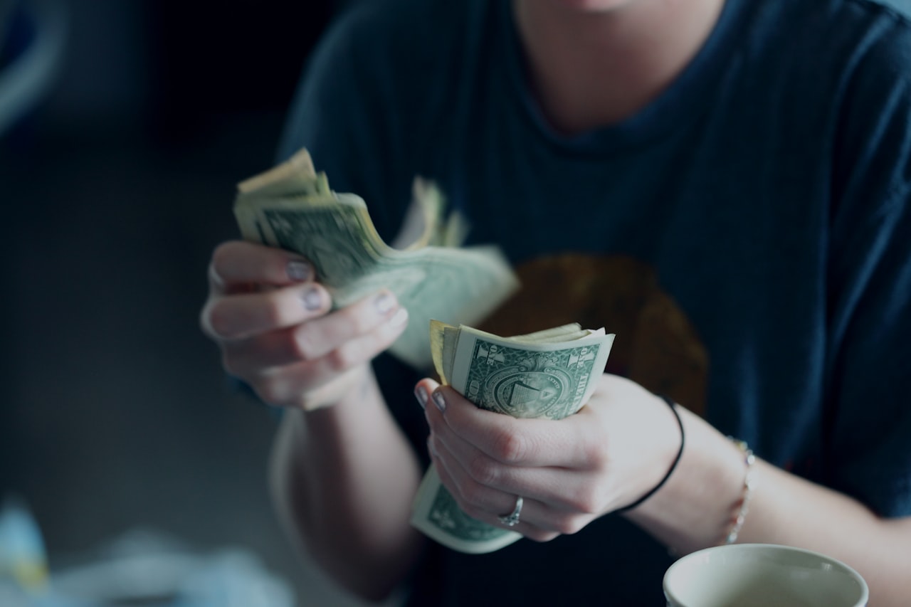 Counting money, representing alimony payments in Georgia