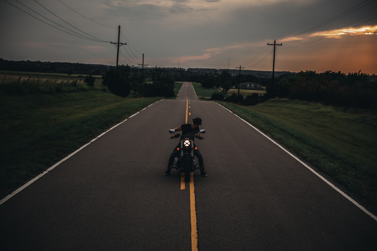 A motorcyclist riding on a Georgia road