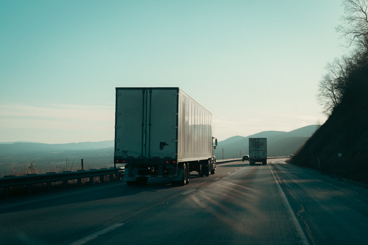 Two semi-trucks on a Georgia highway