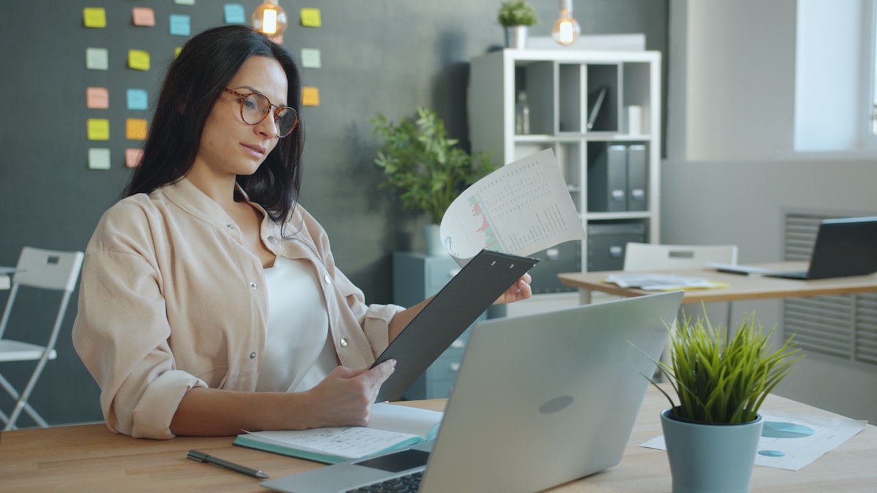 Reviewing disability benefit paperwork at a desk